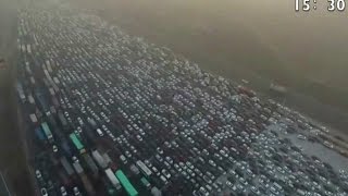 Watch the incredible footage of a 50lane holiday traffic jam in China [upl. by Japha]