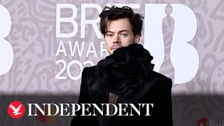 Harry Styles arrives on Brit Awards 2023 red carpet [upl. by Olyhs523]