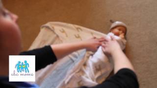 How to Swaddle Baby in a Receiving Blanket [upl. by Anirbas]