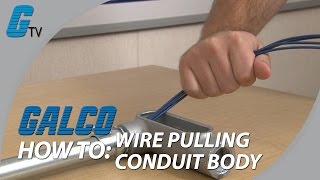 How to Pull Wire Through a Conduit Outlet Body [upl. by Ellehcen]