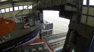 Cromer Lifeboat launching from Cromer Pier Boathouse [upl. by Ahsillek747]