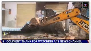 Ghmc town planning officials demolishing the buildings standing on the footpaths in Rajendranagar [upl. by Yelreveb672]