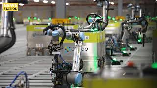 Ocado robots work with robotic arms [upl. by Mabelle]