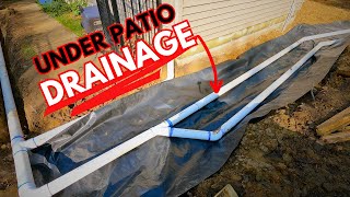 Installing Drainage Under The Patio [upl. by Zzaj]