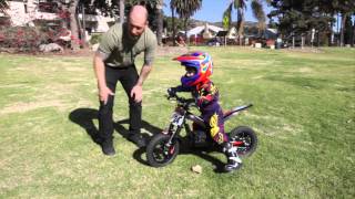 Kid Riding Oset 125 Electric Trials Bike [upl. by Aicinad]