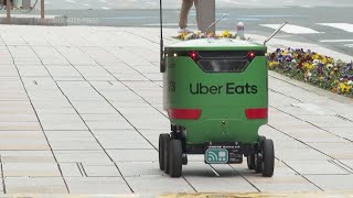 Uber Eats launches robot delivery service in Tokyo [upl. by Aramahs23]