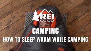 How to Sleep Warm While Camping  REI [upl. by Ahsinrev75]