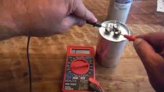 How to test a Dual Run Capacitor from Air Conditioner with a Multimeter [upl. by Kotto]