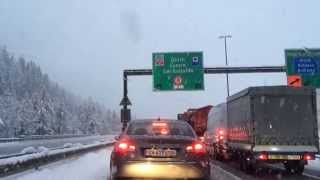 Gotthard tunnel entrance with snow falling [upl. by Kirbie481]