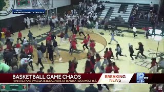 Wauwatosa West evacuated during basketball game because of fight [upl. by Hamid976]