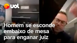 Advogado e cliente tentam enganar juiz e homem se esconde embaixo de mesa em audiência veja vídeo [upl. by Suhploda]