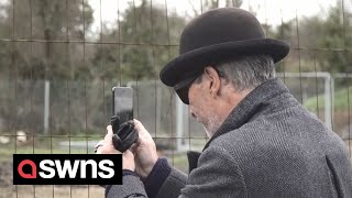 Mystery man in bowler hat sparks rumours Banksy caught on camera  SWNS [upl. by Akelahs]