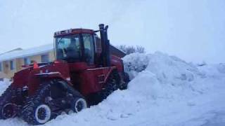 pushing snow case ih steiger stx535 quadtrac leon 4000 6 way blade [upl. by Muna]