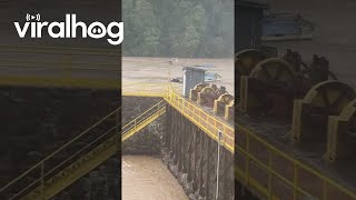 Pontoon Boat Goes Over Flooded Dam in Virginia  ViralHog [upl. by Aihsatan553]