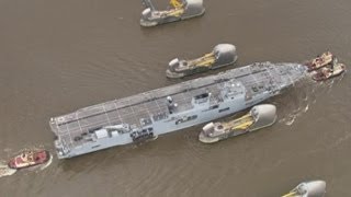 HMS Ocean sails through the Thames Barrier to Greenwich [upl. by Danny976]