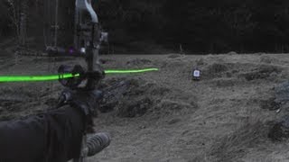 Shooting carbon arrows with lighted nocks from a compound bow [upl. by Yruy]