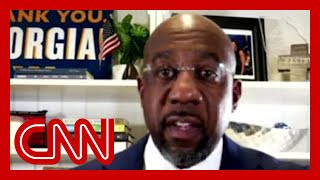 CNN projects Rev Raphael Warnock wins runoff to become first Black senator from Georgia [upl. by Filemon]