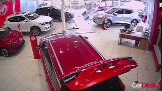 Car smashes into Sandicliffe MG car dealership [upl. by Luiza]