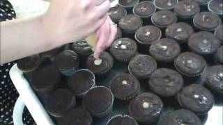 How to fill a cupcake using a Wilton tip 230 [upl. by Couhp]