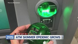 ATM skimmer epidemic grows [upl. by Anoiek745]