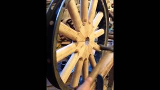 Vintage wooden car wheel spokes under compression [upl. by Etteuqal]