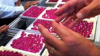 Glass filled heat treated Rubies at The Bangkok Gem show [upl. by Elberta41]