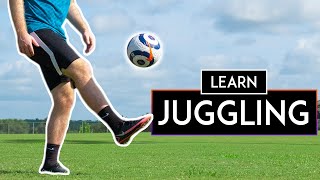 How to JUGGLE a Soccer Ball for Beginners [upl. by Wally]