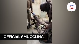 WATCH  Prison guard allegedly caught with contraband strapped to his body in Kimberley prison [upl. by Elumas]