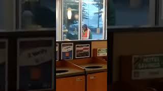 Angry homeless man destroy glass at McDonalds [upl. by Ibloc]