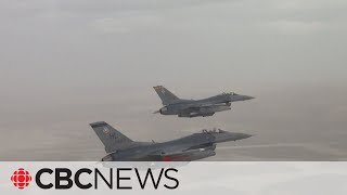 US F16 fighter jets strike weapons depots in Syria [upl. by Ronacin]