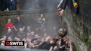 Royal Shrovetide Football in Ashbourne Derbyshire  SWNS [upl. by Knight]