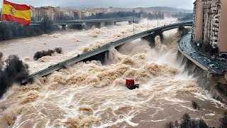 Spain in chaos Mallorca evacuated Floods sweep hundreds of vehicles into river [upl. by Kcinemod]