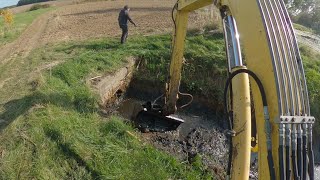 Clearing The Culvert And And Desilting The Drainage Ditch With An Excavator [upl. by Adnamal]