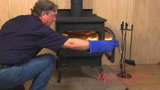 How to Light amp Maintain a Wood Stove Fire [upl. by Ystap]