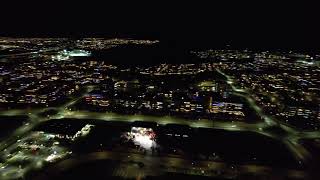 Volcano glow seen from capital area barely Neighborhood of Vellir closest to Grindavik Drone 4K [upl. by Ahsoym]