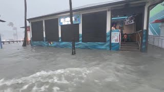 Tracking Debby Rising waters around restaurants and buildings on Fort Myers Beach [upl. by Eicam]