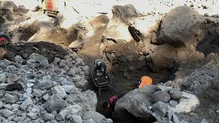 see the sand miners are looking for black sand among the rocks [upl. by Nedac]