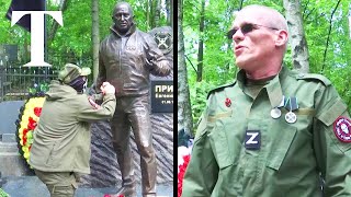 Wagner soldiers unveil Prigozhin statue at grave in Russia [upl. by Tacye]