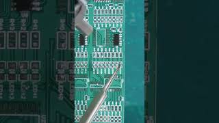 Solder SMD components  Solder capacitors on soldering practice board [upl. by Wandis]