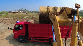 Wheel Loaders Loading Dump Trucks [upl. by Eikceb]