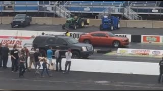 2014 GMC Yukon Denali vs 2010 Dodge Charger RT Daytona Drag Race [upl. by Stodder]