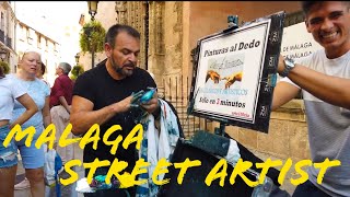 Málaga Pinturas al dedo street artist finger painting Malaga city centre [upl. by Willms]