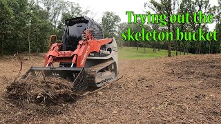 Root Raking With The Skeleton Bucket On The TL12r2 [upl. by Anahsar]