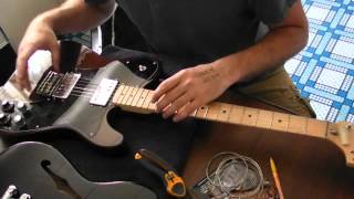 Changing guitar strings with Vintage Fender Tuners [upl. by Ymac]