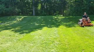 Scag Liberty Z Mowing Tall Thick Wet Grass on Hilly Property [upl. by Anirbes]