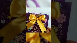 How to make a bow  ribbon bow  bow making  tie a ribbon on gift bag giftbag shorts [upl. by Acinoreb572]