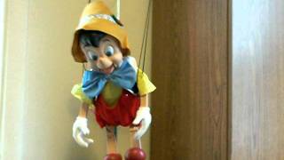 Pinocchio singing dancing Walt Disney Christmas toy [upl. by Wessling]