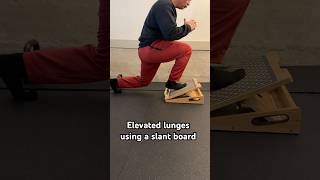 Elevated lunges using a slant board slantboard functionaltraining lunges workout legworkout [upl. by Leamsi]