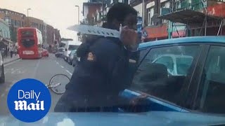 Shocking moment cyclist pulls knife on driver in fit of road rage [upl. by Norab828]