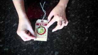 Christmas Tag Garland with fabric flowers and Jenni Bowlin Studio [upl. by Nezam]